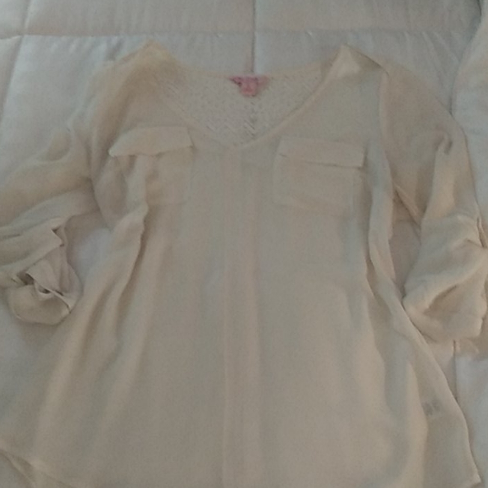 Cream colored blouse